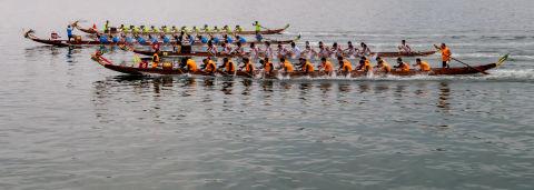 People Racing in dragon boats