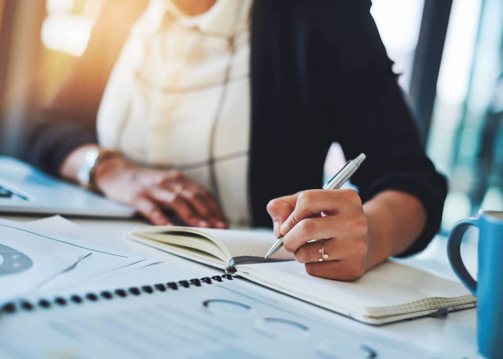 woman writing a report