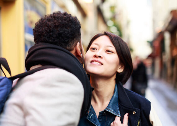 young couple greeting each other