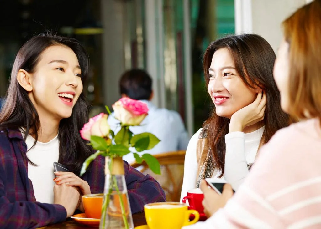 group of chinese women in a cafe