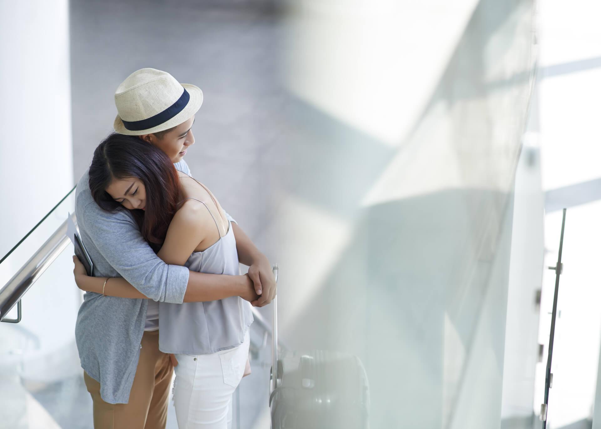 young chinese couple in love hugging