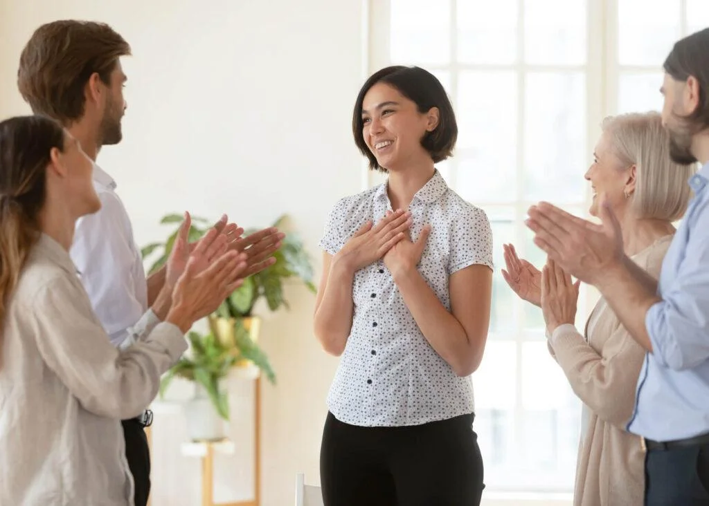 young woman complimenting her colleagues