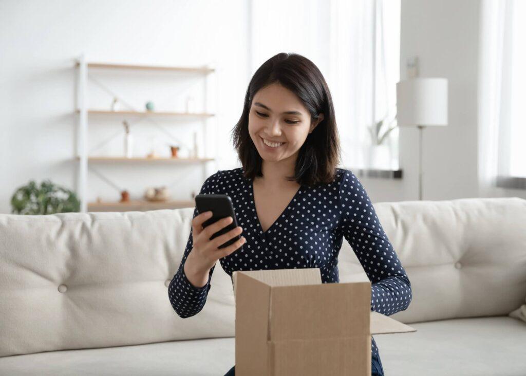 woman unpacking parcel