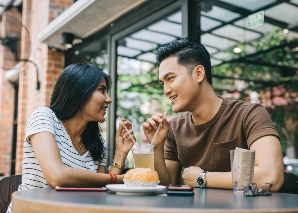 young couple on a date in a cafe