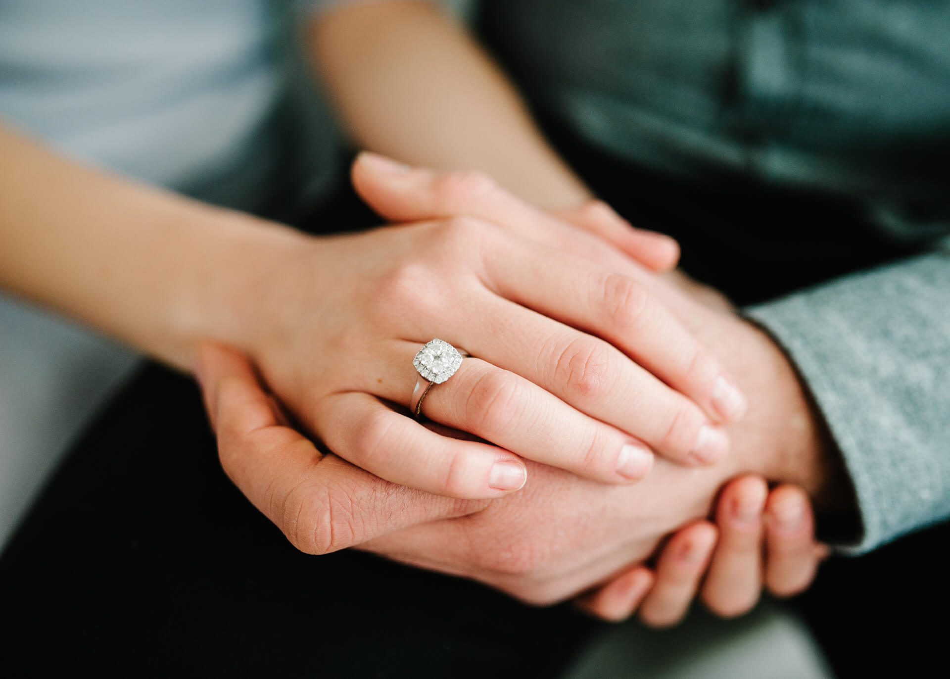 female hands with engagement ring