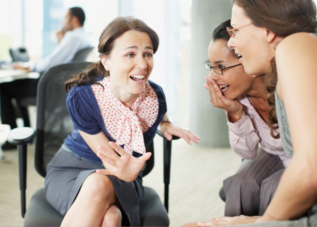 women gossiping in the office