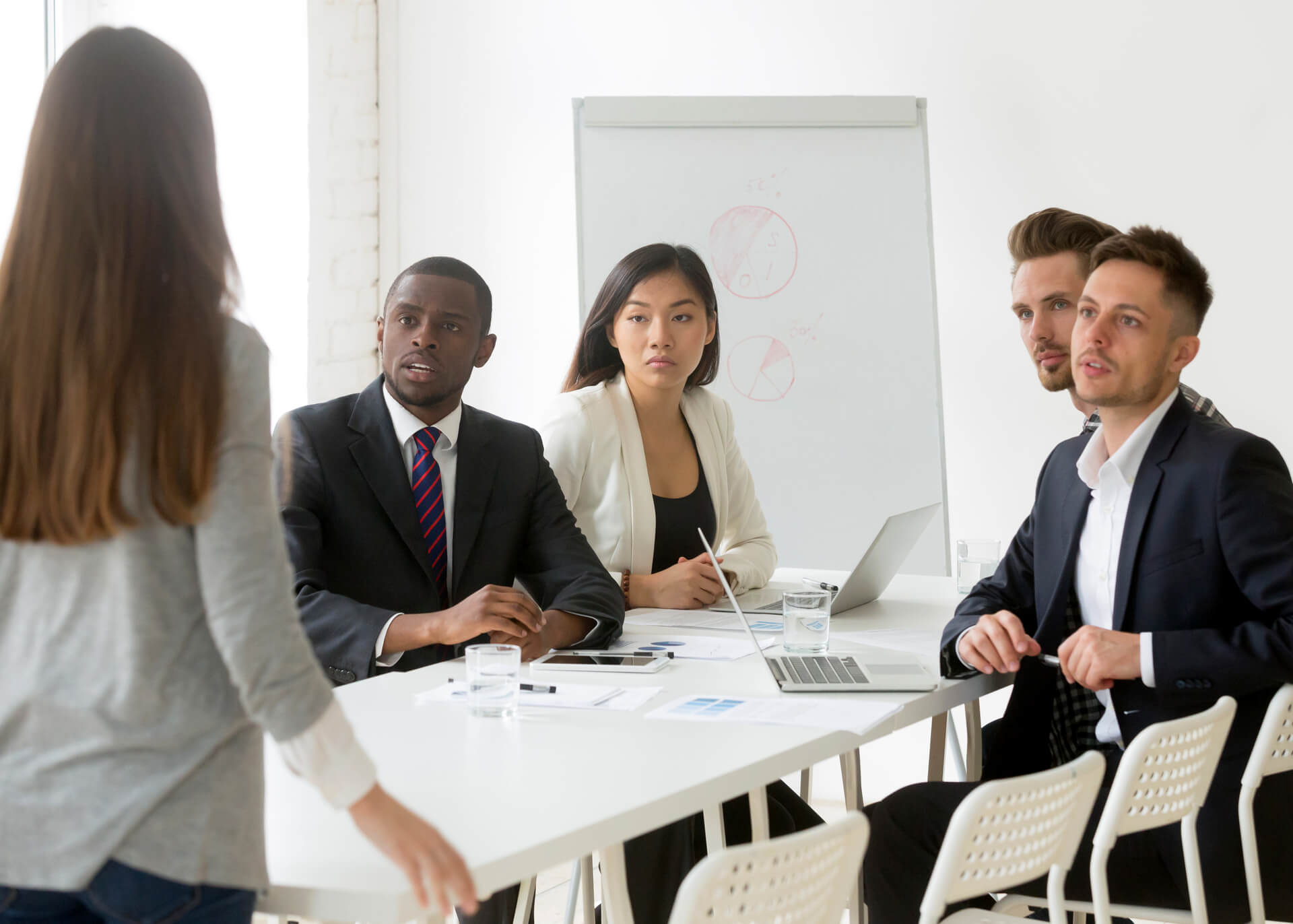 woman apologizing for being late to the meeting