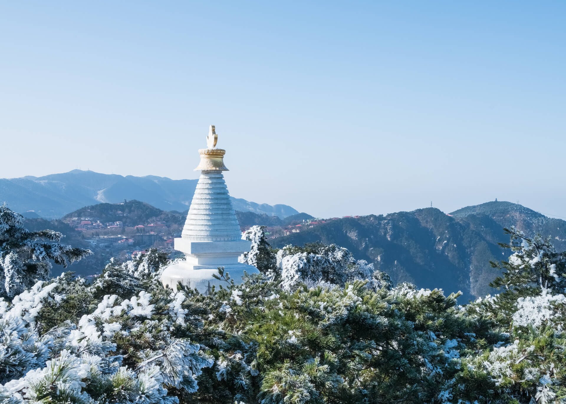 white pagoda in the mountains
