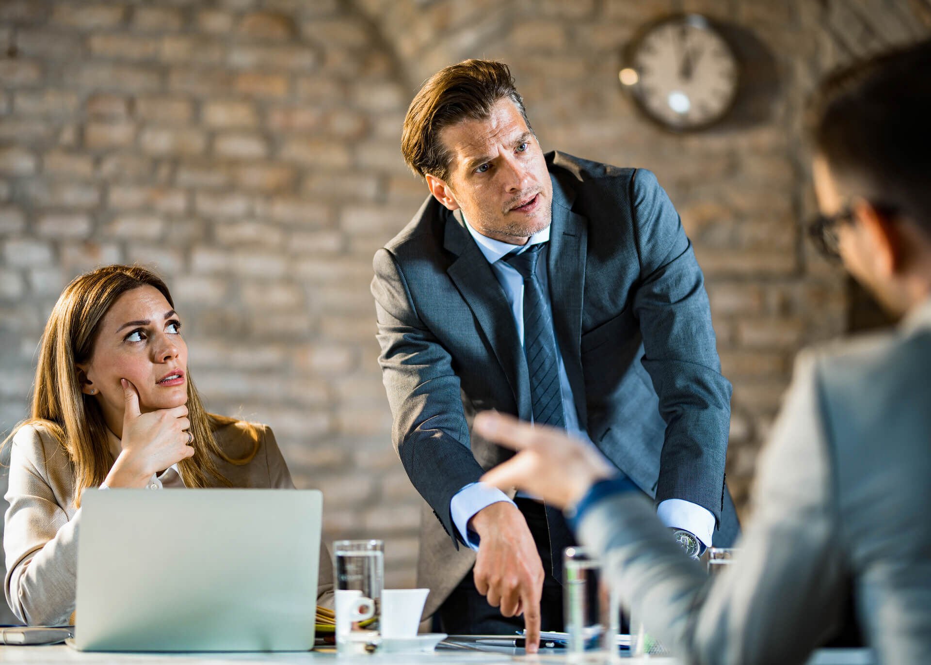 businessman arguing with colleagues