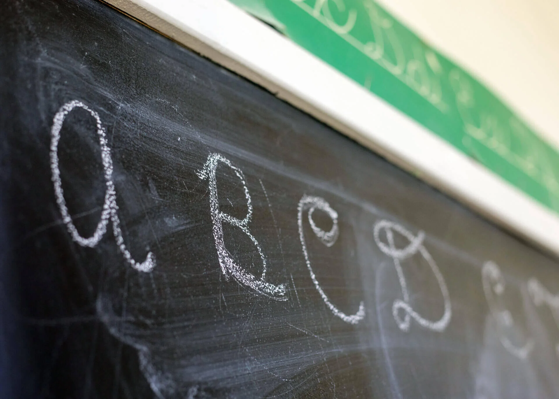 abcd written on a blackboard