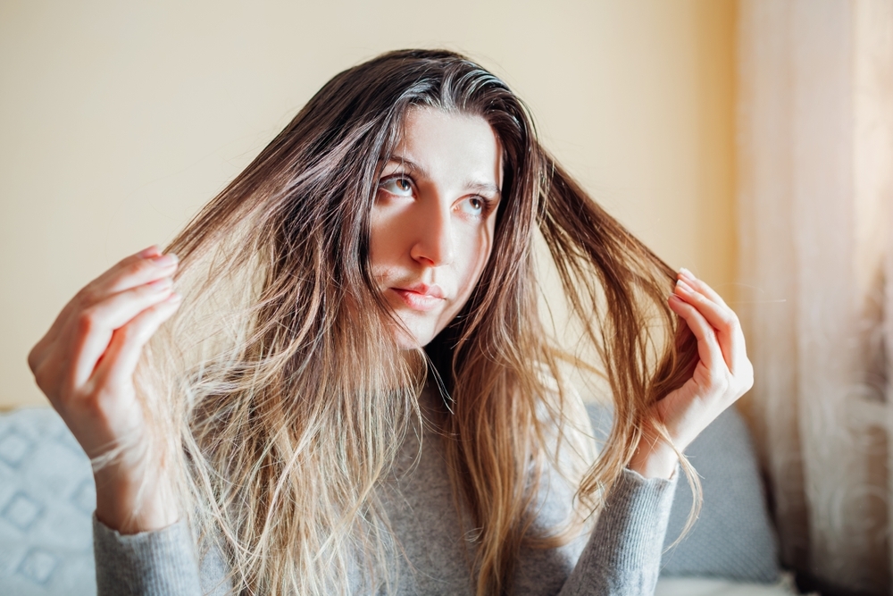 Confused women playing with hair