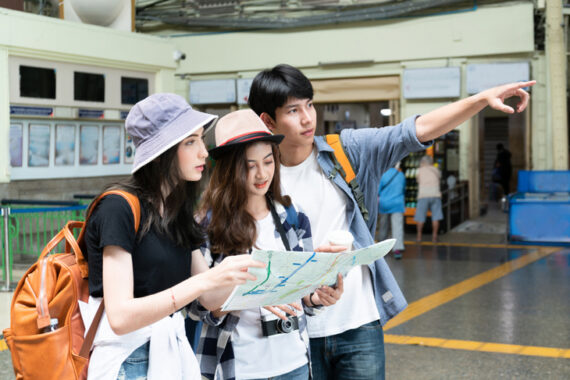 group-tourist-travelling-looking-location-on-map