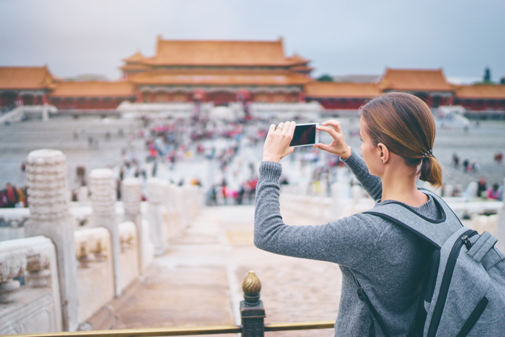 woman-enjoys-vacation-in-china