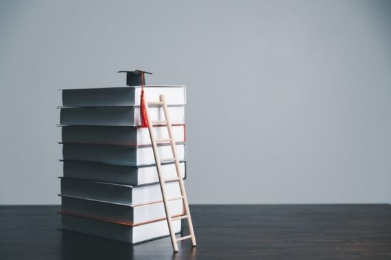 studying-climbing-book-stack-concept-of-education-process