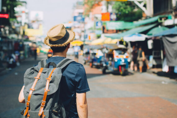 young-asian-traveling-shopping-for-souvenirs